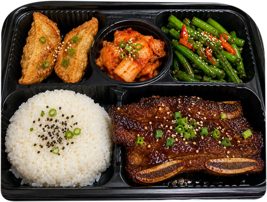 KQ Bistro Korean BBQ rib plate with steamed rice, dumplings, kimchi and spicy green beans
